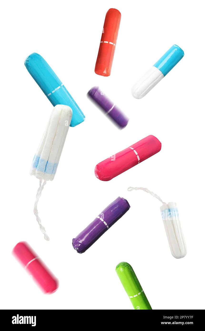 Many tampons falling on white background. Menstrual hygienic product