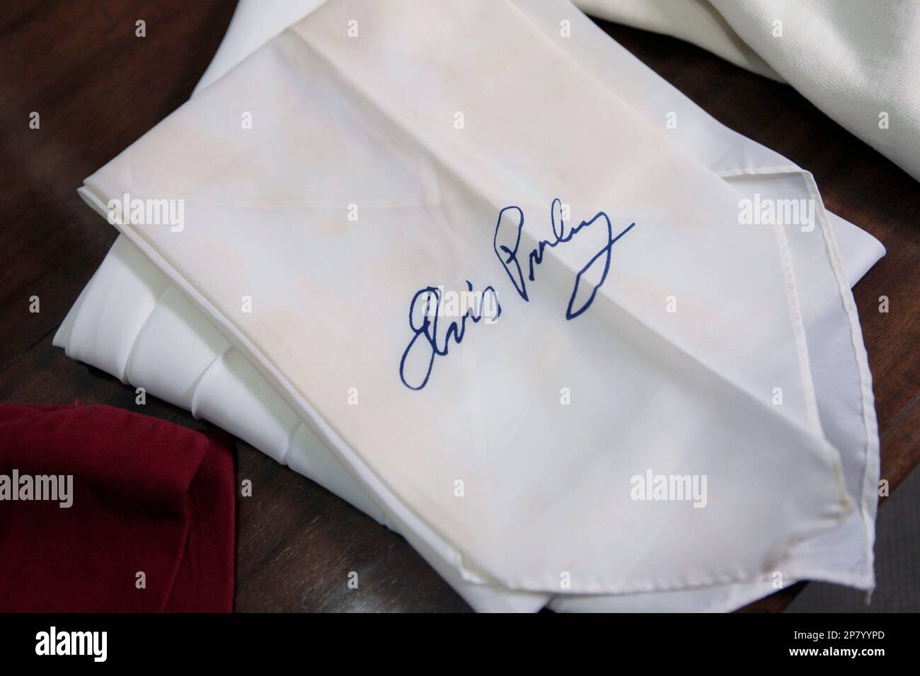 Two of Elvis Presley's concert-worn, sweat-stained scarves, part of The  Gary Pepper Collection of Elvis Presley Memorabilia, is seen at Leslie  Hindman Auctioneers, Monday, Oct. 12, 2009, in Chicago. Over 200 Elvis -related