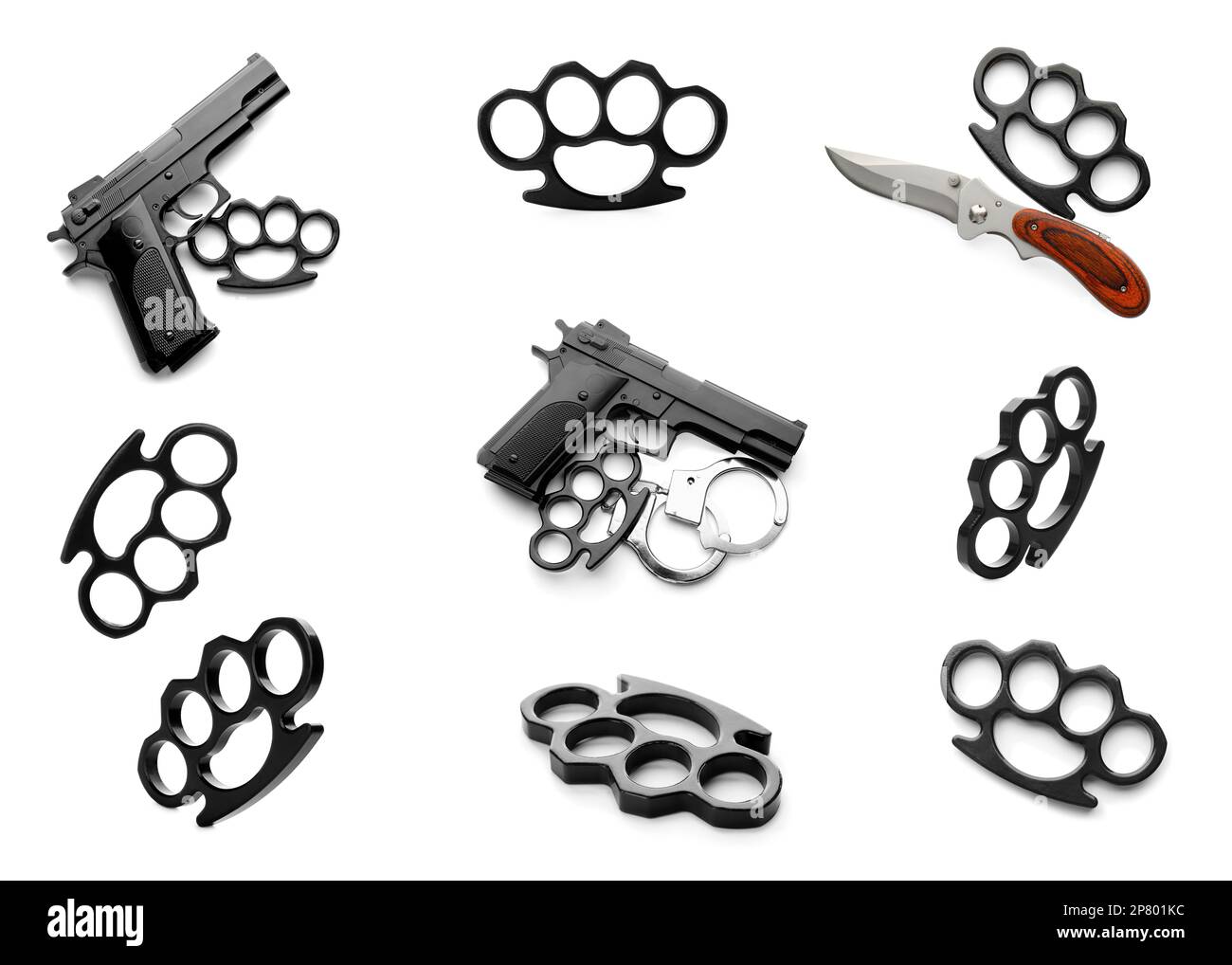 Set with black brass knuckles, guns and knife on white background Stock