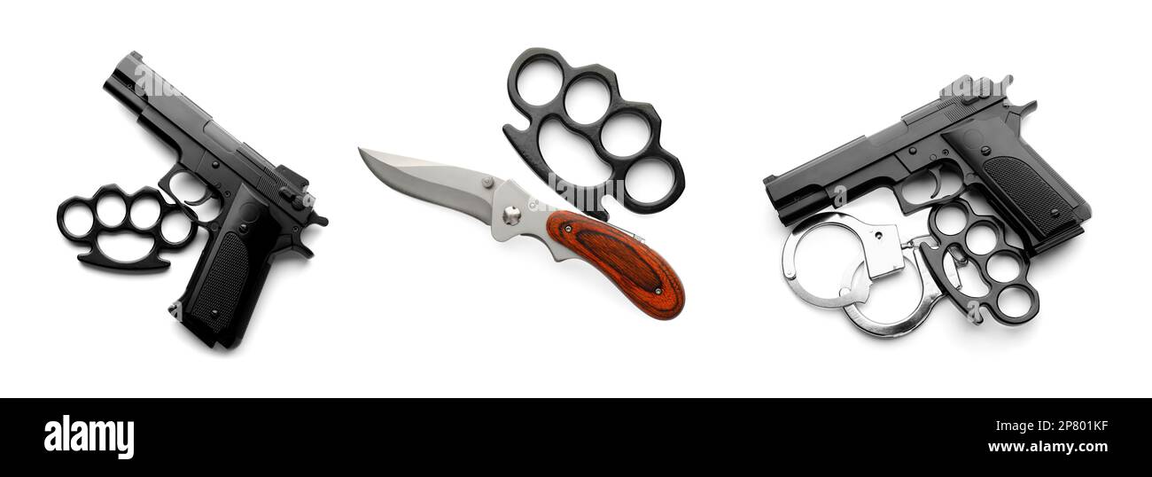 Set with black brass knuckles, guns and knife on white background, top
