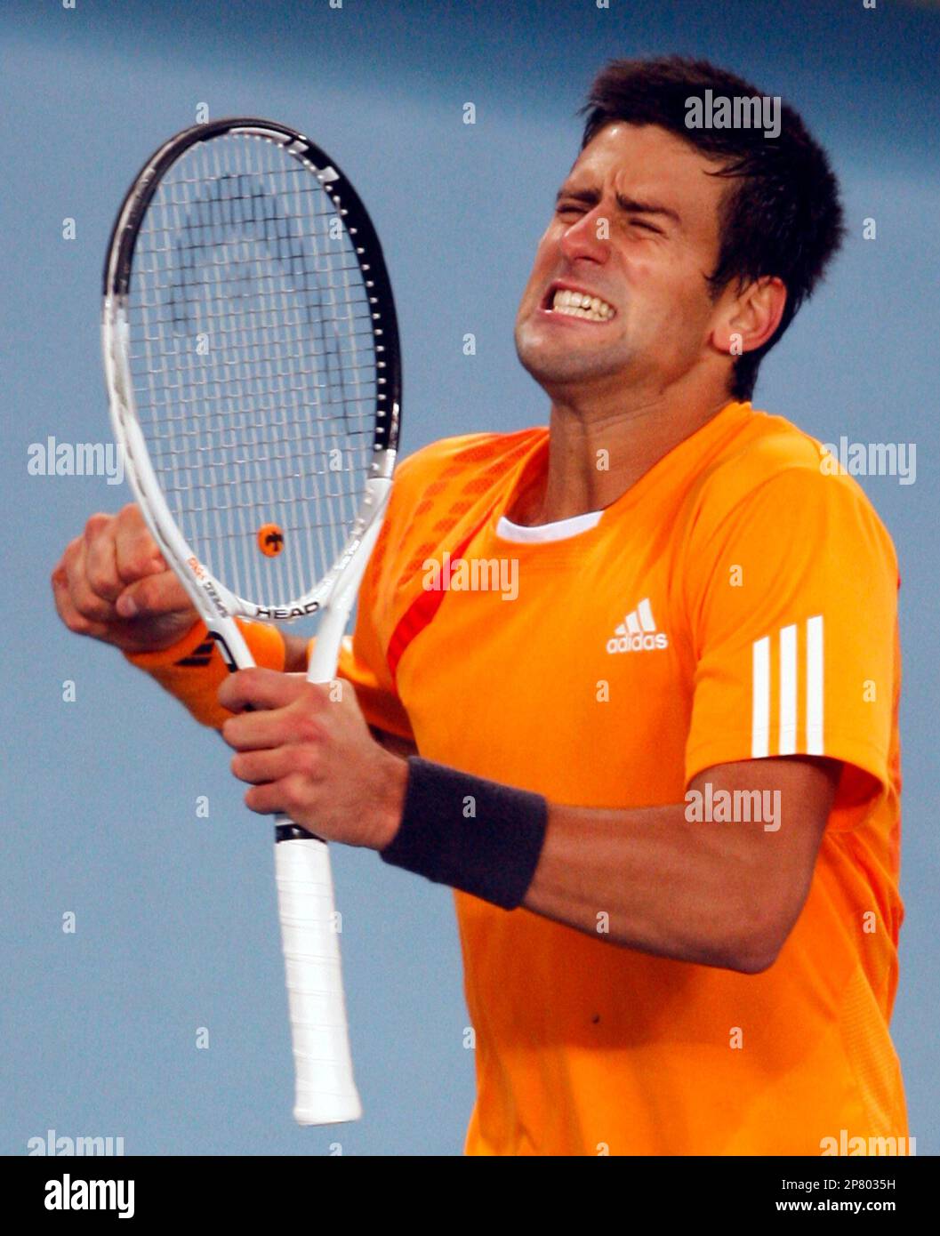 Serbias Novak Djokovic celebrates after winning a point against Croatias Marin Cilic in the final of the China Open tennis tournament held in Beijing Sunday, Oct. 11, 2009