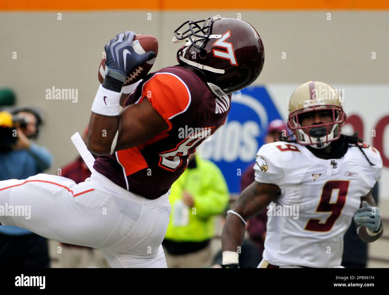 Virginia Tech's Jarrett Boykin (left) catches a touchdown pass in the