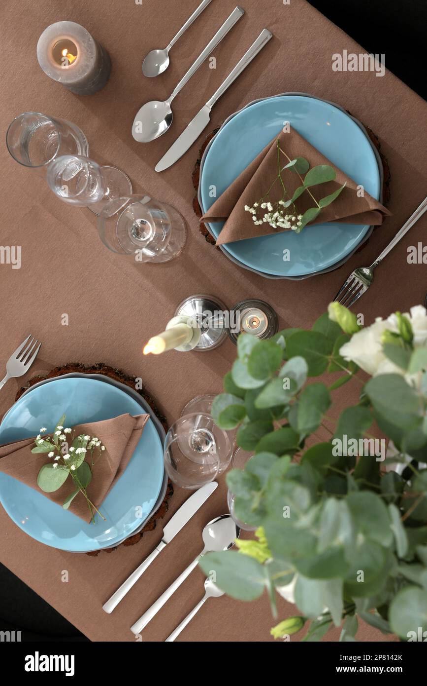 Festive table setting with beautiful tableware and decor, top view Stock Photo
