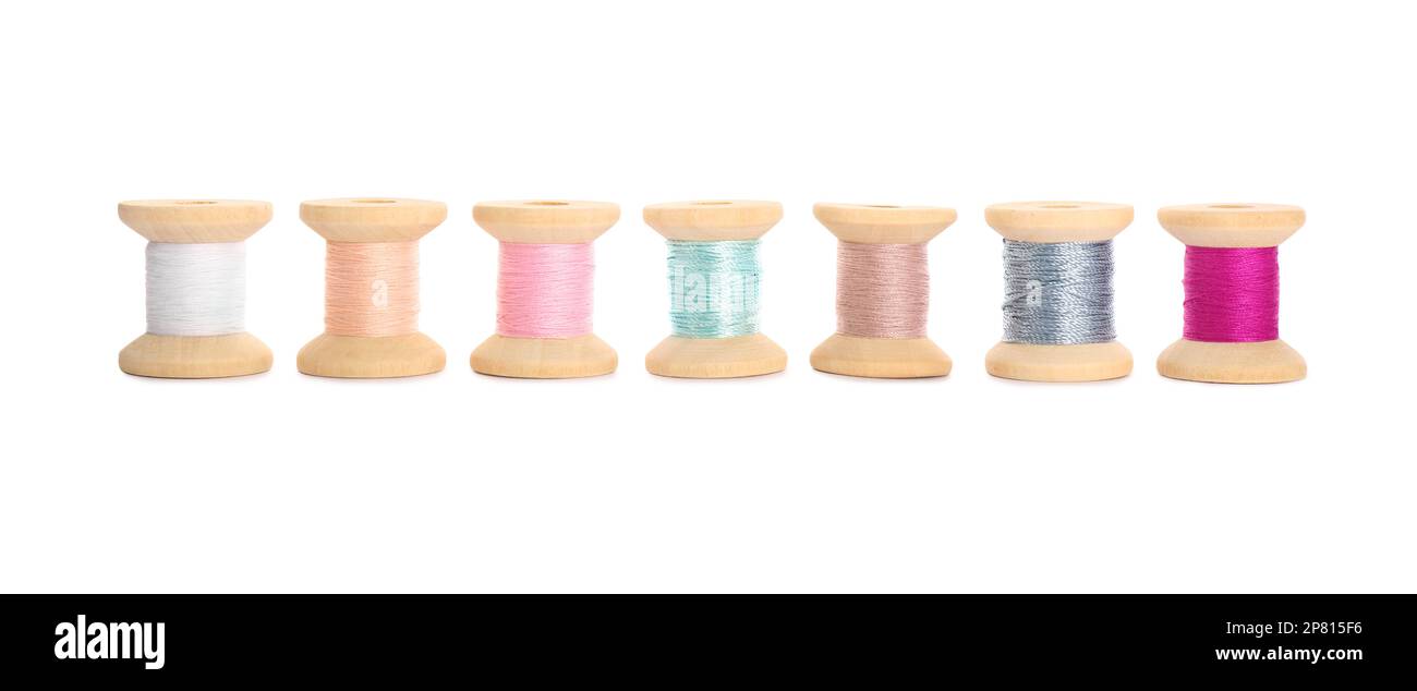 Set of colorful sewing threads on white background Stock Photo - Alamy