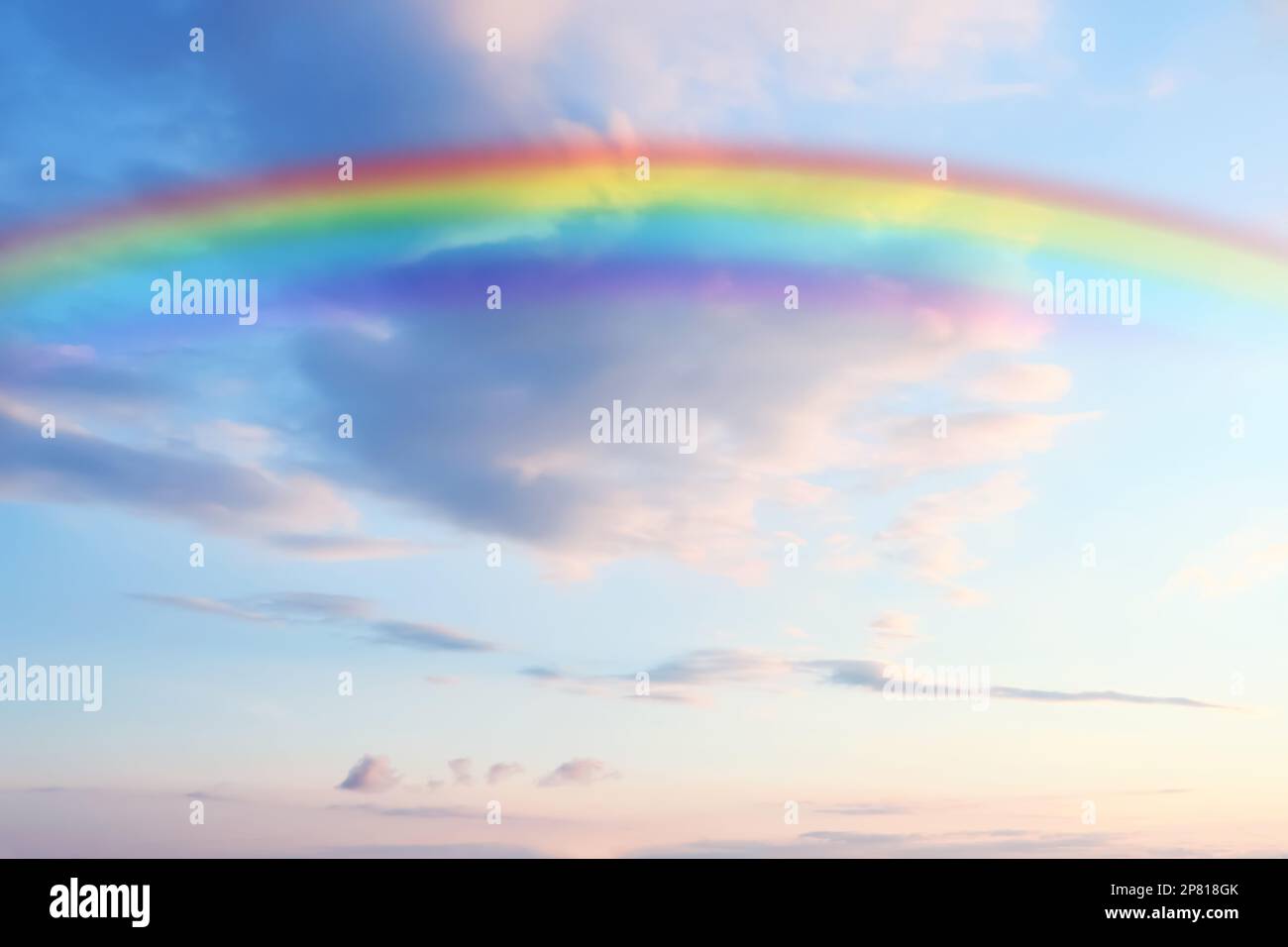 Beautiful rainbow in blue sky with white clouds on sunny day Stock ...