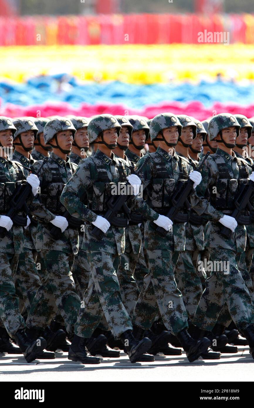 Chinese People's Liberation Army (PLA) soldiers march past Tiananmen ...