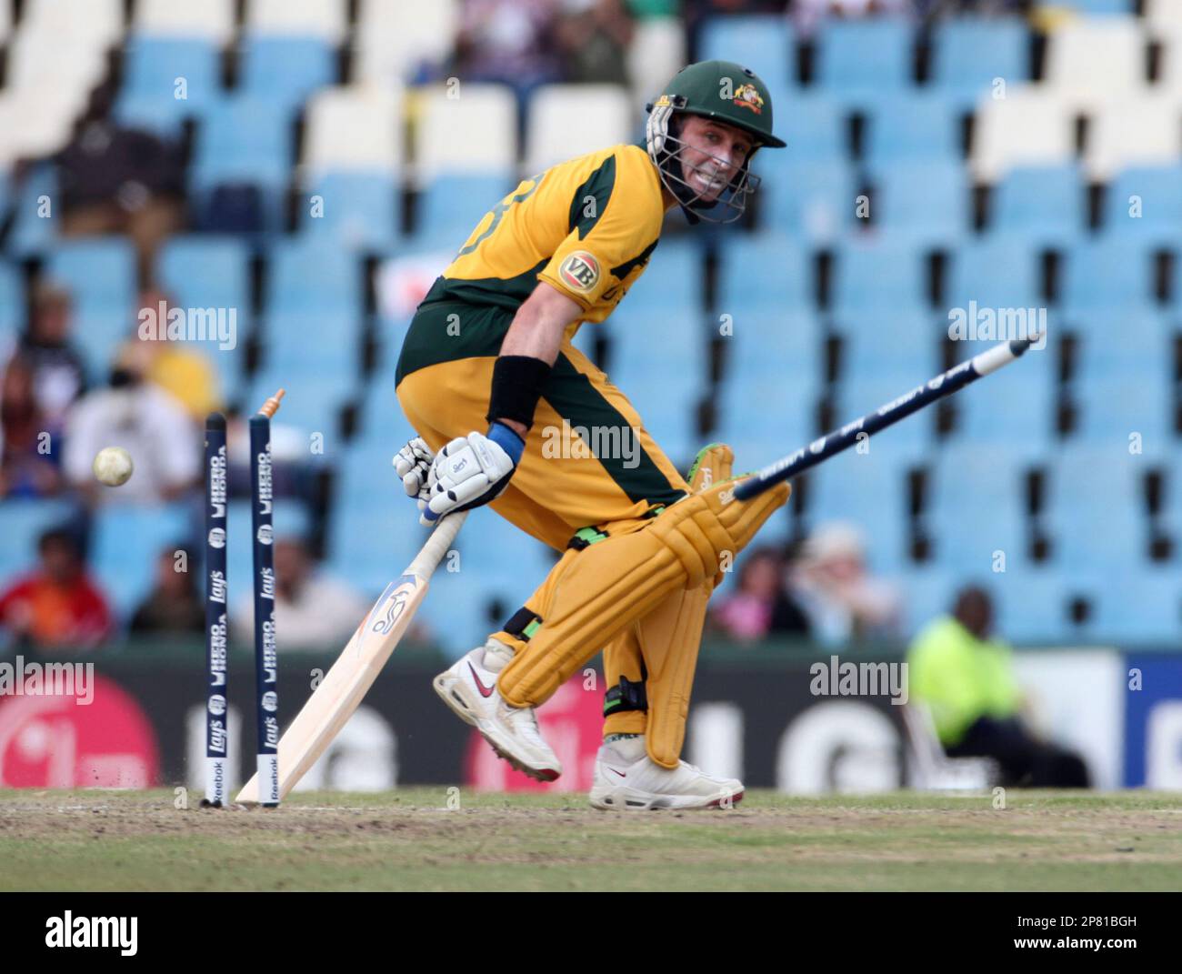 Australian batsman Mike Hussey reachs his crease safely during their