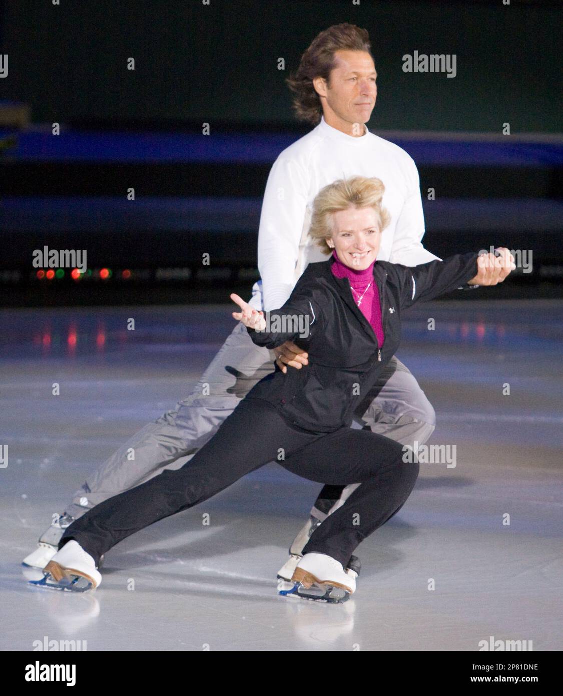 Former professional hockey player Ron Duguay, left, and figure skater Barbara Underhill skate during a media event for the CBC series