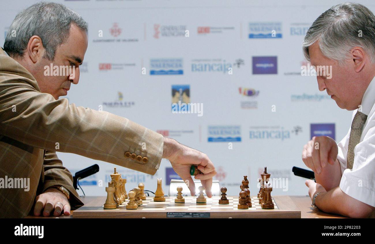 Former chess world champions Garry Kasparov, right, and Anatoly Karpov,  left, play an exhibition rematch in Valencia, Spain, Tuesday, Sept. 22,  2009. Chess eminences Kasparov and Karpov are dusting off their knights