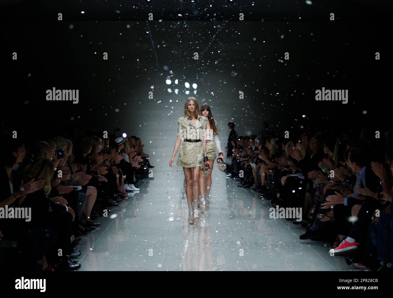 Models present creations by Burberry from their Spring Summer 2010