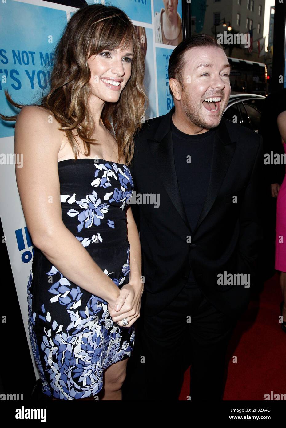 Cast members Jennifer Garner, left, and Ricky Gervais pose together at
