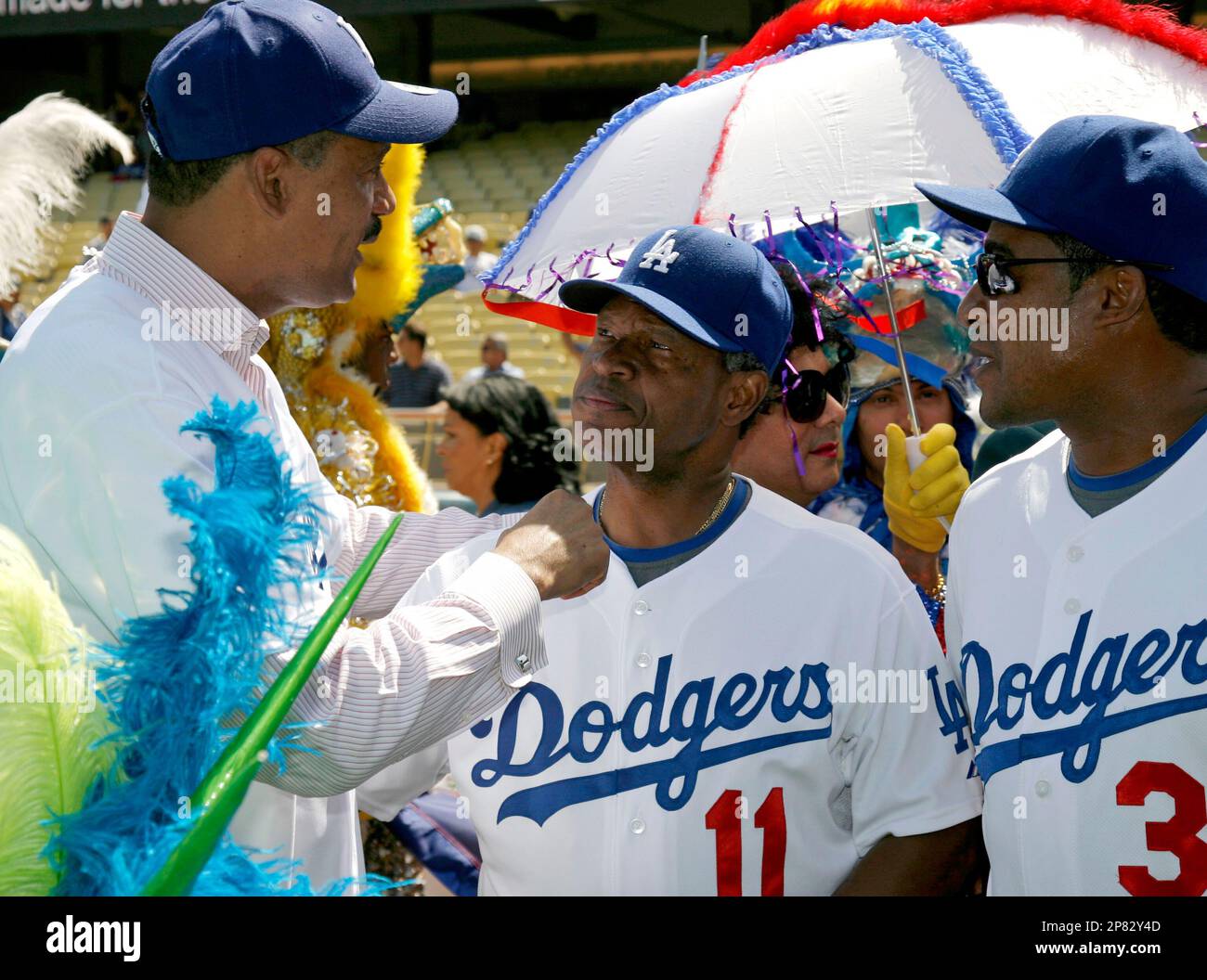 ftSan Francisco Giants manager Dusty Baker, left, gets together with Los  Angeles Dodgers hitting coach Manny Mota before the start of their four  game series at Dodger Stadium, Sept. 16, 2002, in Los Angeles. (AP  Photo/Kevork Djansezian Stock Photo