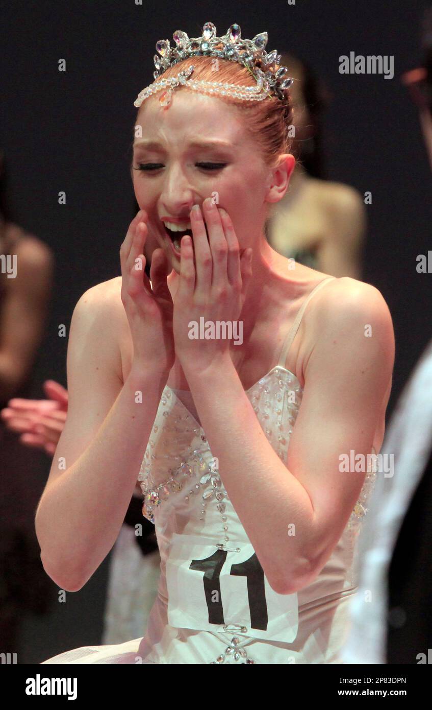 Claudia Dean, 16, of Australia reacts when she won the Gold Medal
