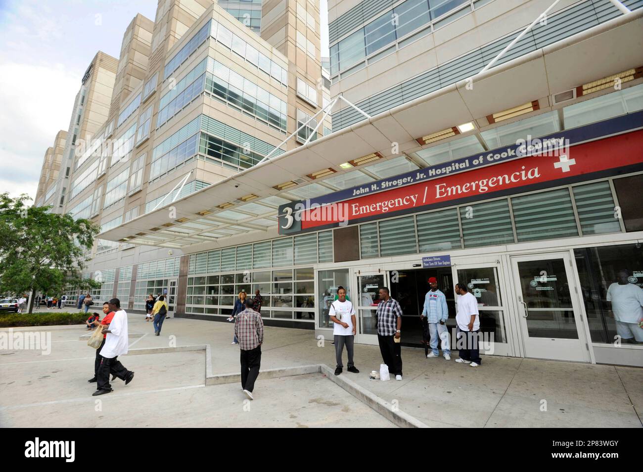 In this July 30, 2009 photo, people stand in front the the emergency