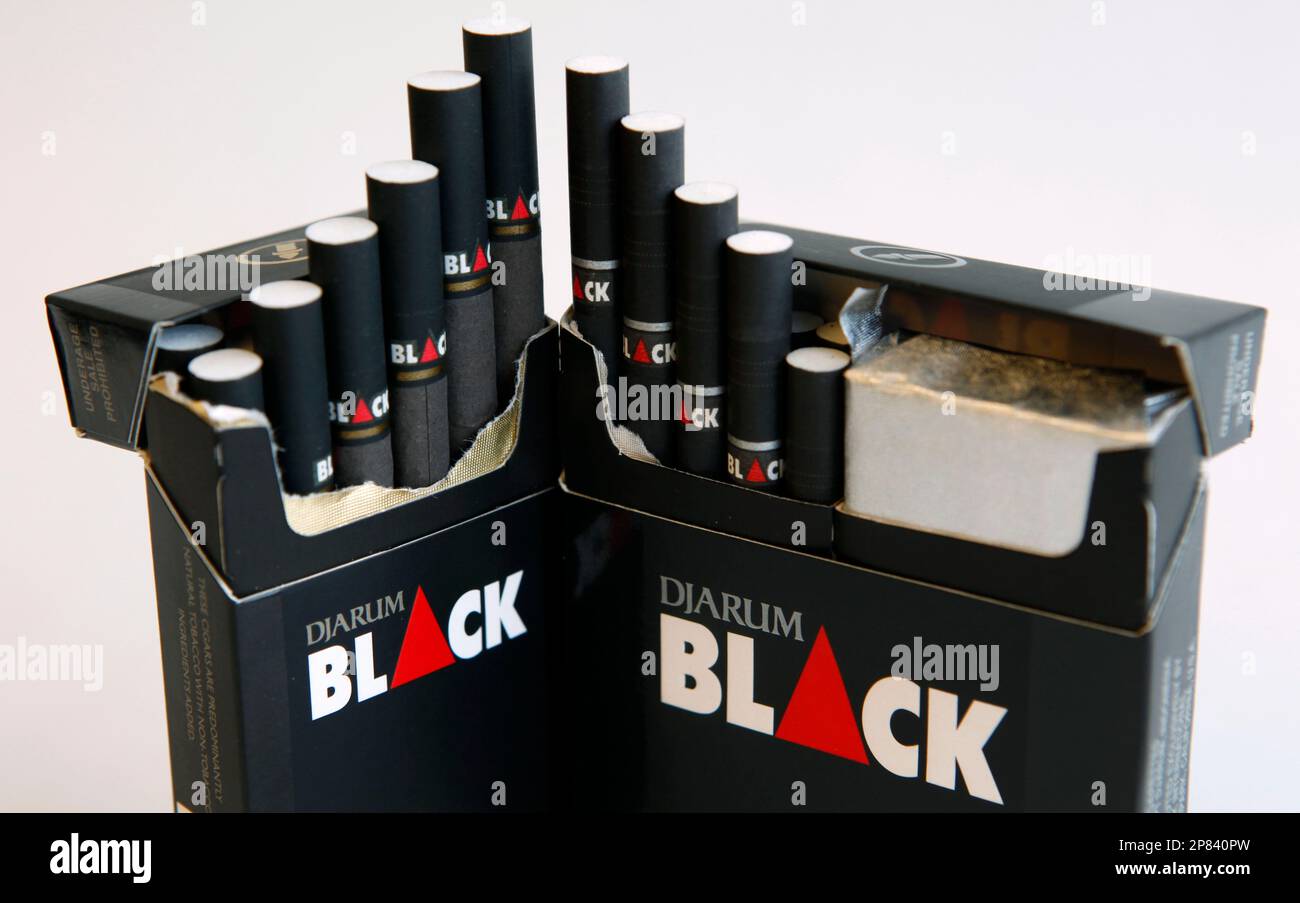 In this photo made Aug. 18, 2009 Djarum Black cigars, left, and