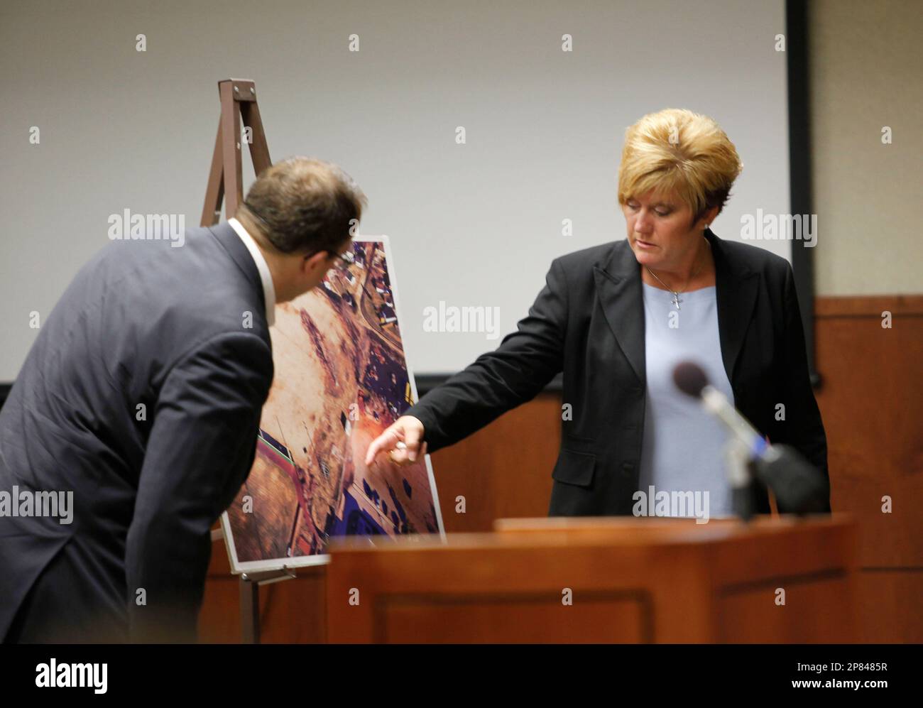 Jon Heck, left, the prosecuting attorney in the case against David