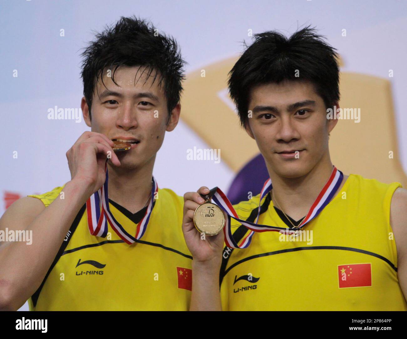 China's Cai Yun, left and Fu Haifeng pose with medals after winning the ...