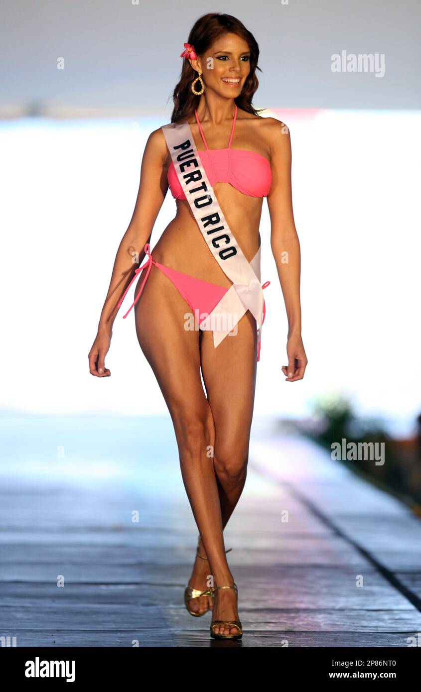 Miss Puerto Rico Mayra Matos walks the runway during a swimsuit event in  Freeport, Grand Bahama island, Sunday, Aug. 9, 2009. Contestants from 84  countries will compete for the coveted crown of