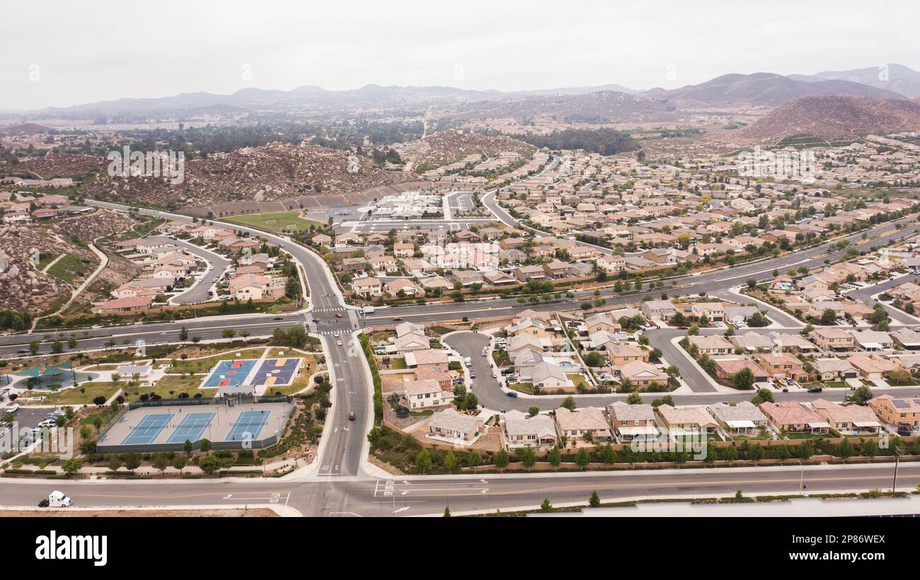 Aerial view of a sprawling neighborhood of family homes in Menifee