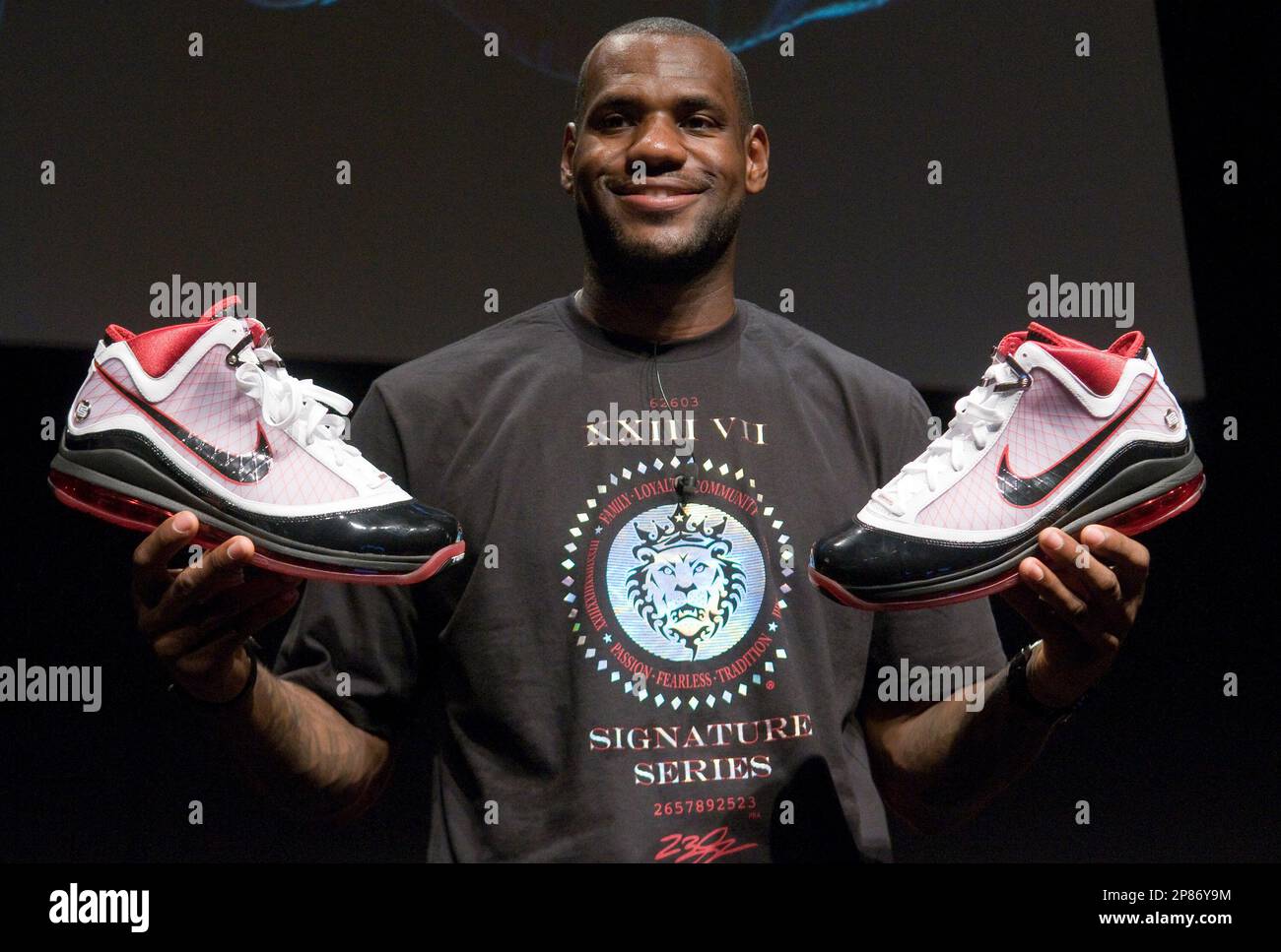Cleveland Cavalier forward LeBron James reveals his new Nike Air Max LeBron  VII shoes during an event at Ed Davis Community Center in Akron, Ohio on  Friday, Aug. 7, 2009 in Cleveland,
