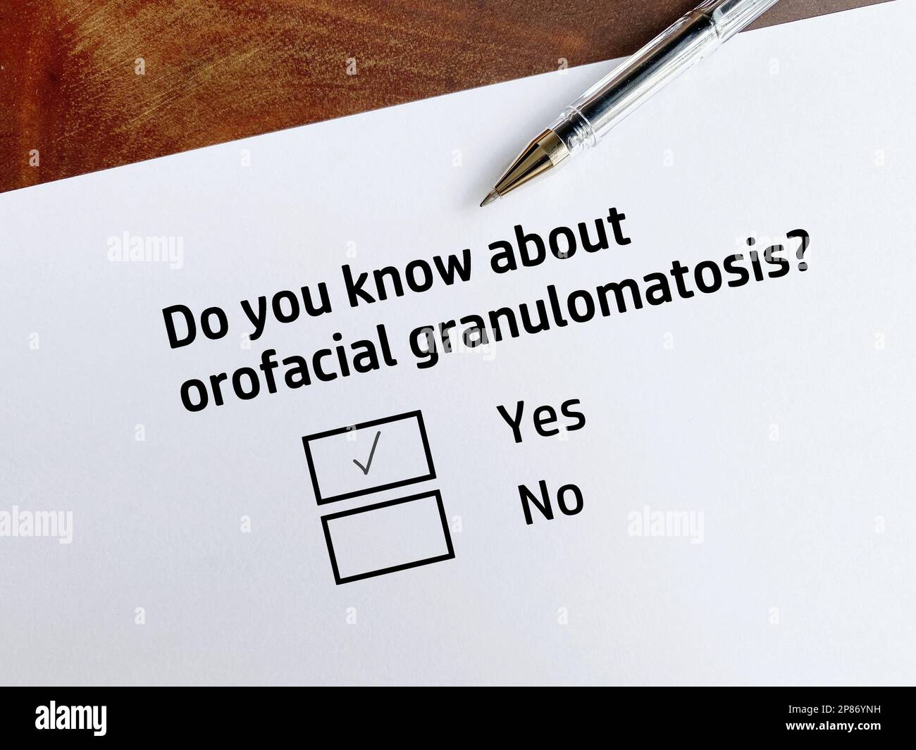 One person is answering question about dental care. She knows about orofacial granulomatosis. Stock Photo