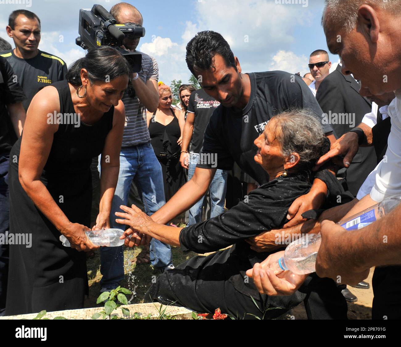 Relatives of Maria Balogh, a Gypsy (Roma) woman who was shot dead