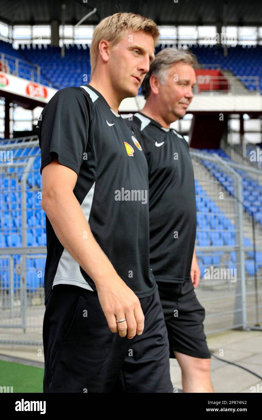 Iceland's KR Reykjavik sports director Runar Kristinsson, left, and coach  Logi Olafsson arrive for a training session in Basel, Switzerland,  Wednesday Aug. 5, 2009. Reykjavik face Switzerland's FC Basel in a Europa