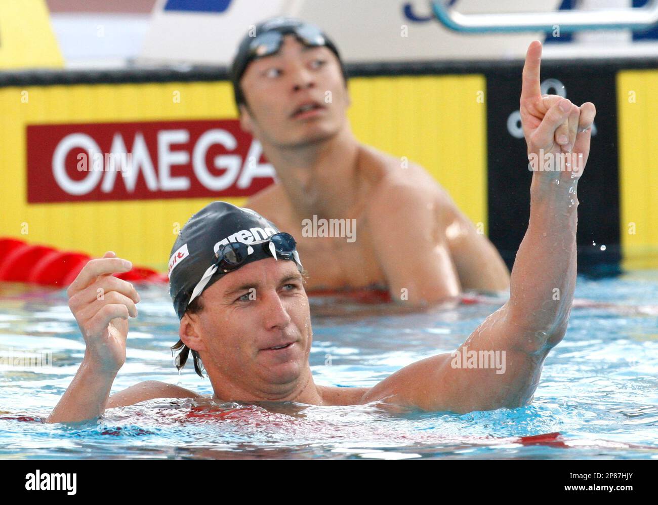 Aaron Peirsol of the United States celebrates after winning a Men's