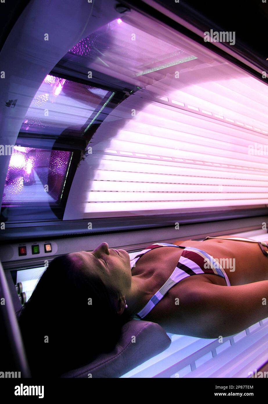 FILE In this Wednesday, Dec. 14, 2005 file photo, a woman lies in a