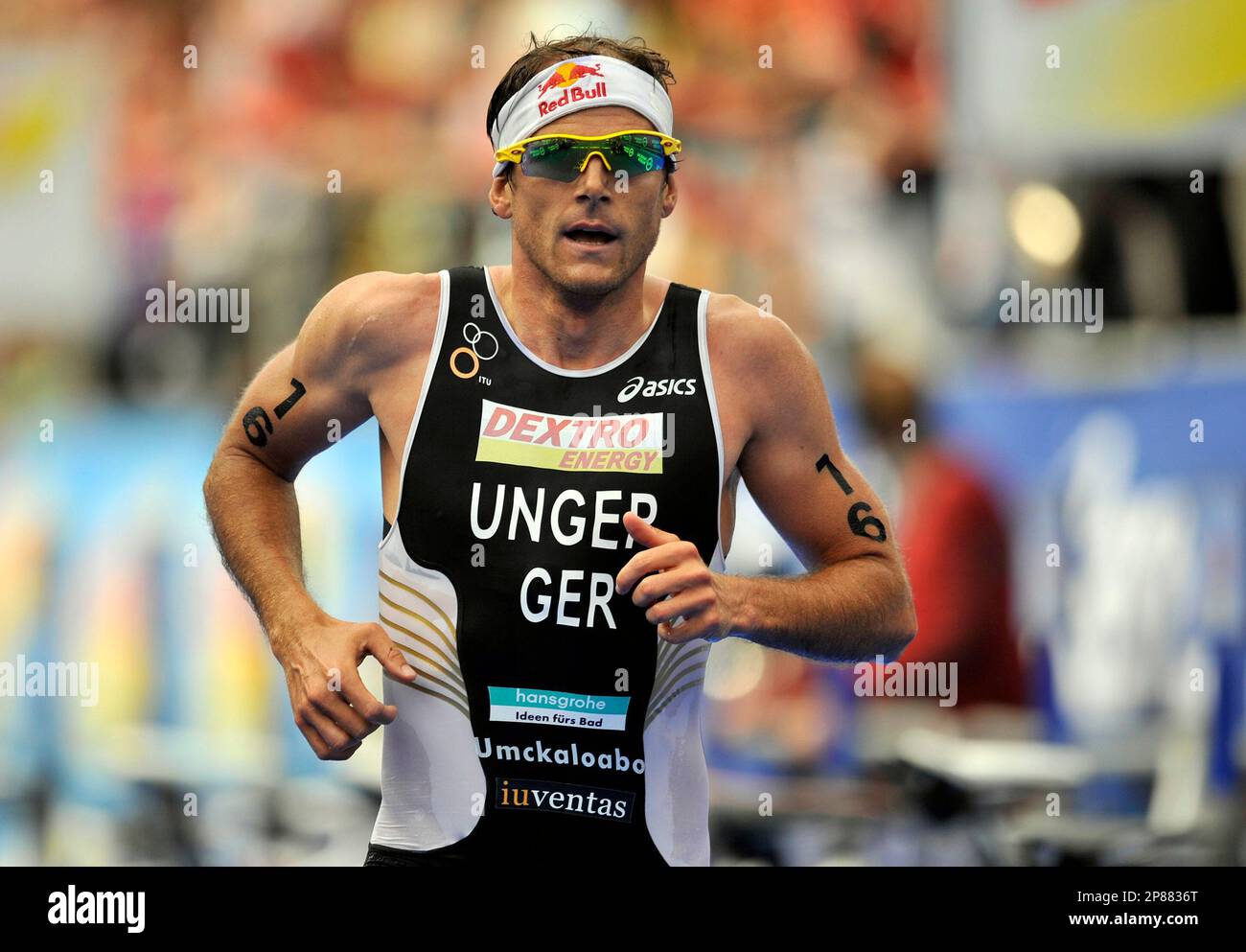 German athlete Daniel Unger is seen on his way during his race at the ITU men's Triathlon World Championship Series in Hamburg, northern Germany, Sunday, July 26, 2009. (AP Photo/Axel Heimken) Stock Photo