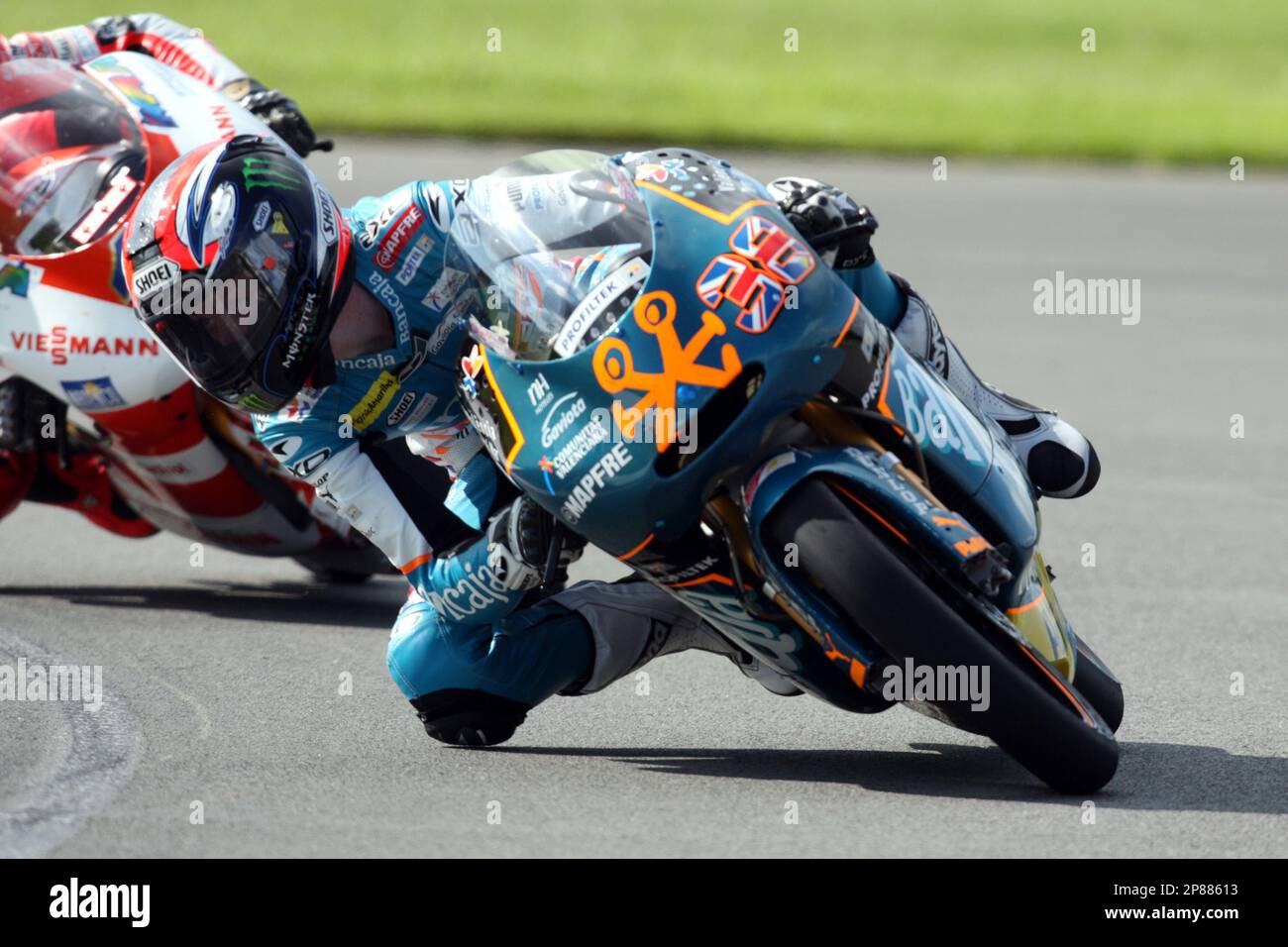 Bancaja Aspar Team's MotoGP rider Bradley Smith takes the Melbourne loop  during practice at the British Motorcycle Grand Prix at the Donington  Circuit, in Donington, England, Saturday July 25, 2009. (AP Photo/Tom
