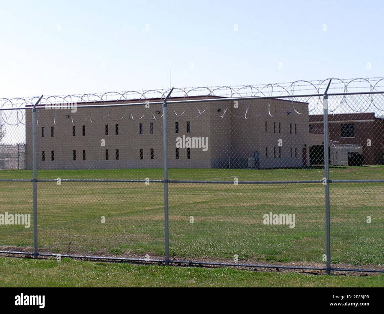 FILE In this April 6, 2004 file photo, a high fence and razor wire surround the juvenile