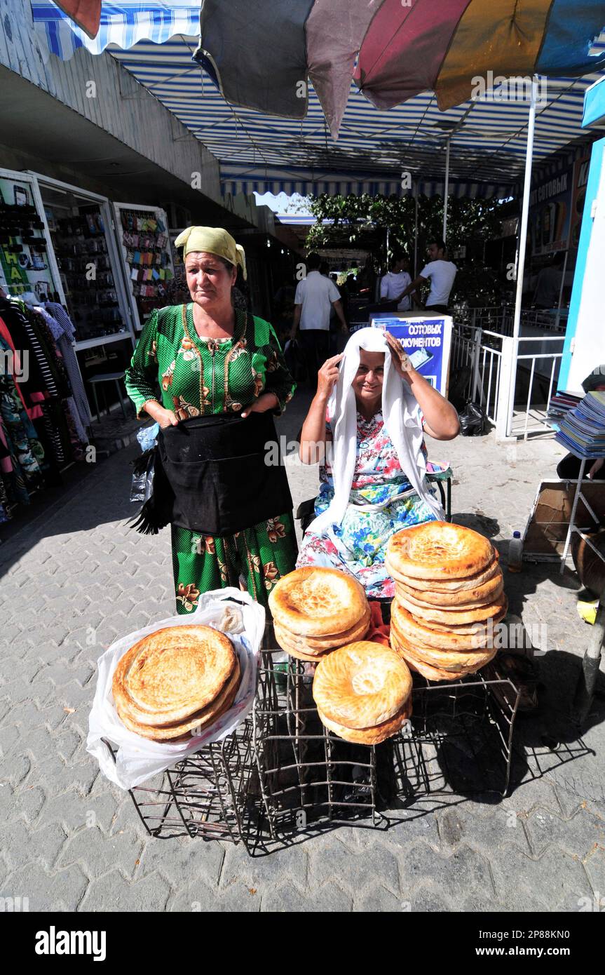 Obi Non- a traditional Uzbek / Tajik bread sold at the market in Bukhara, Uzbekistan. Stock Photo