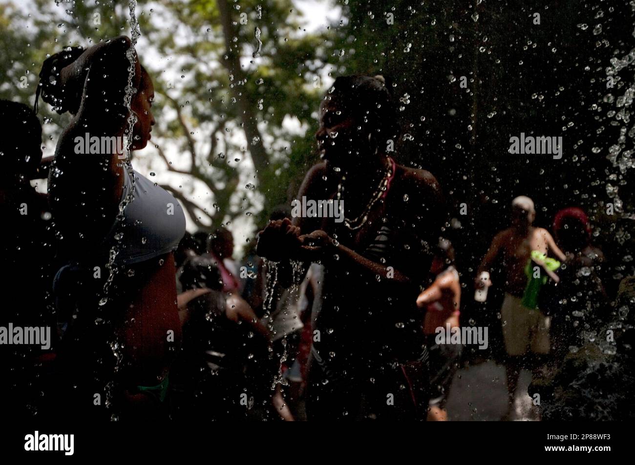 Voodoo Pilgrims Bathe In A Waterfall Believed To Have Purifying Powers In Saut D Eau Haiti