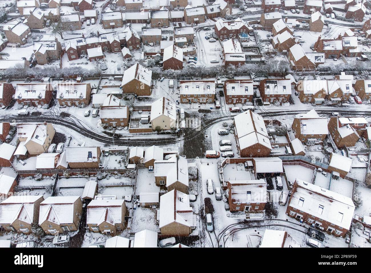 Heavy snow covers houses in Burton Latimer, Northamptonshire. Picture