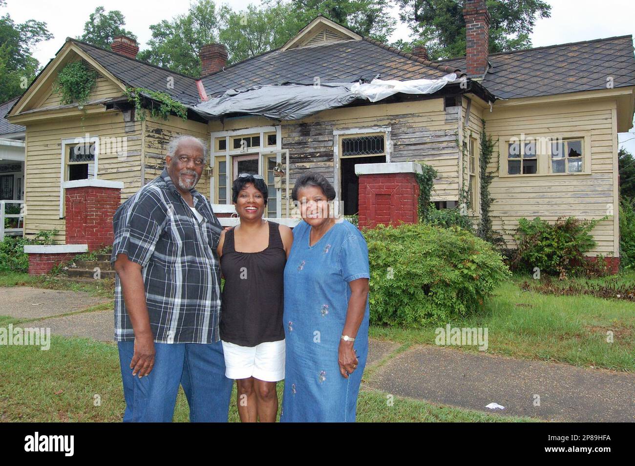 In this Monday, July 6, 2009 picture, James Brown, left and his wife