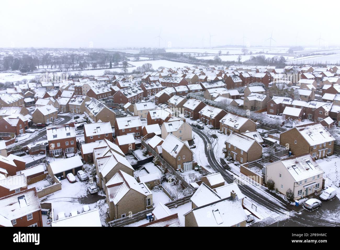 Heavy snow covers houses in Burton Latimer, Northamptonshire. Picture