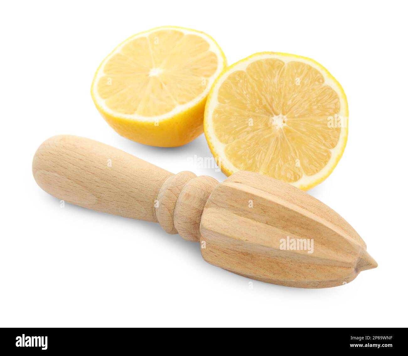 Wooden citrus reamer and fresh lemon on white background Stock Photo