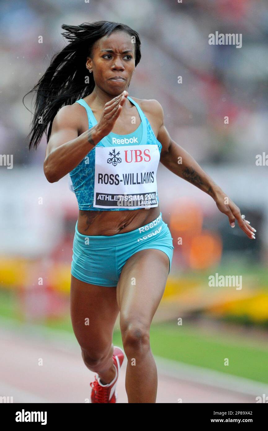 Tiffany Ross-Wiliams runs the women's 400 m hurdles race at the