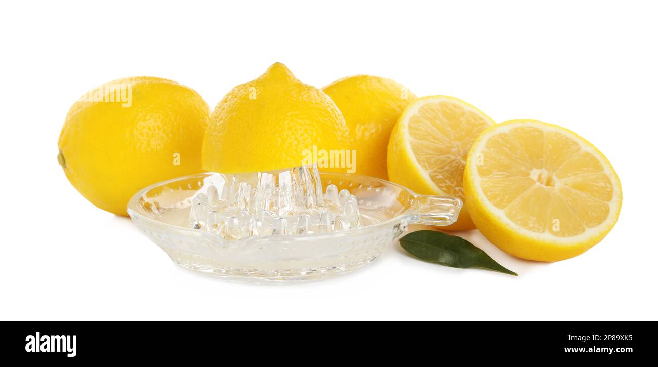 Plastic juicer and fresh lemons on white background Stock Photo Alamy