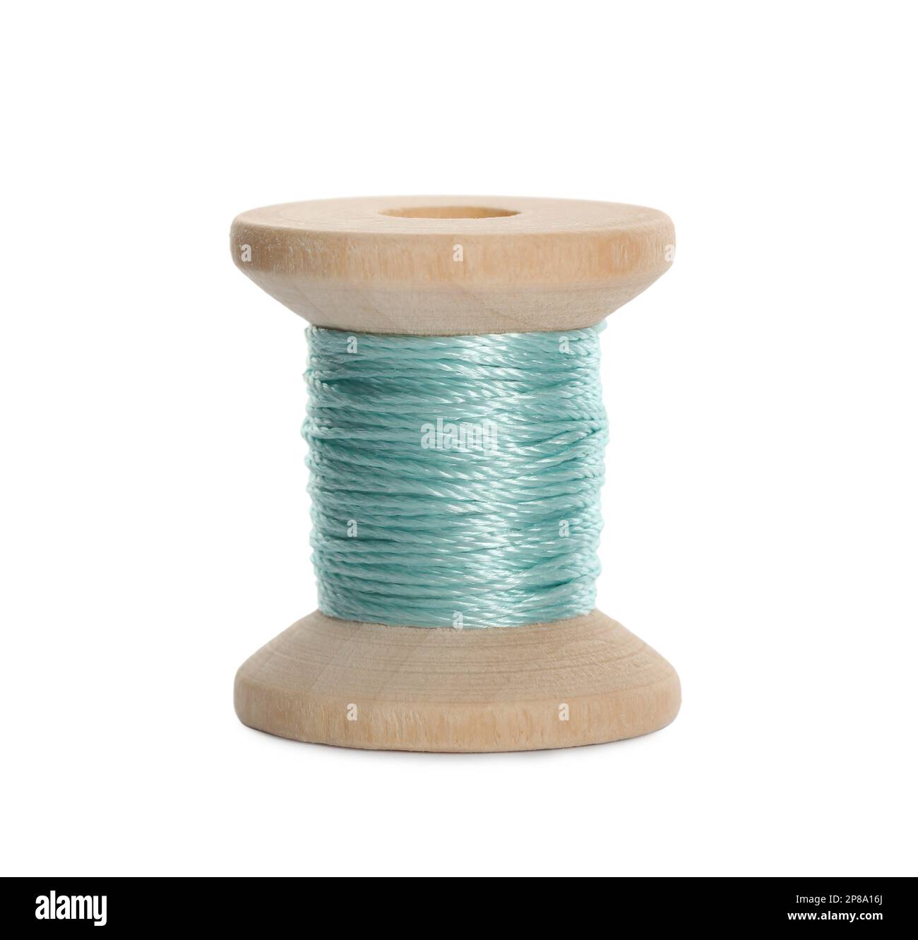 Wooden spool of turquoise sewing thread isolated on white Stock Photo ...