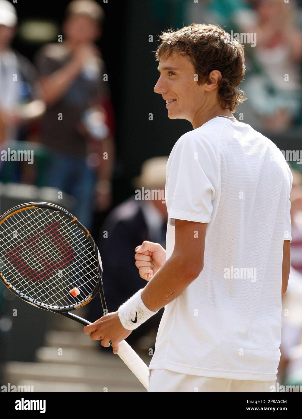 Andrey Kuznetsov of Russia reacts at match point defeating Jordan Cox of  U.S. during their boys final match on court No. 1 at Wimbledon, Sunday,  July 5, 2009. (AP Photo/Kirsty Wigglesworth Stock