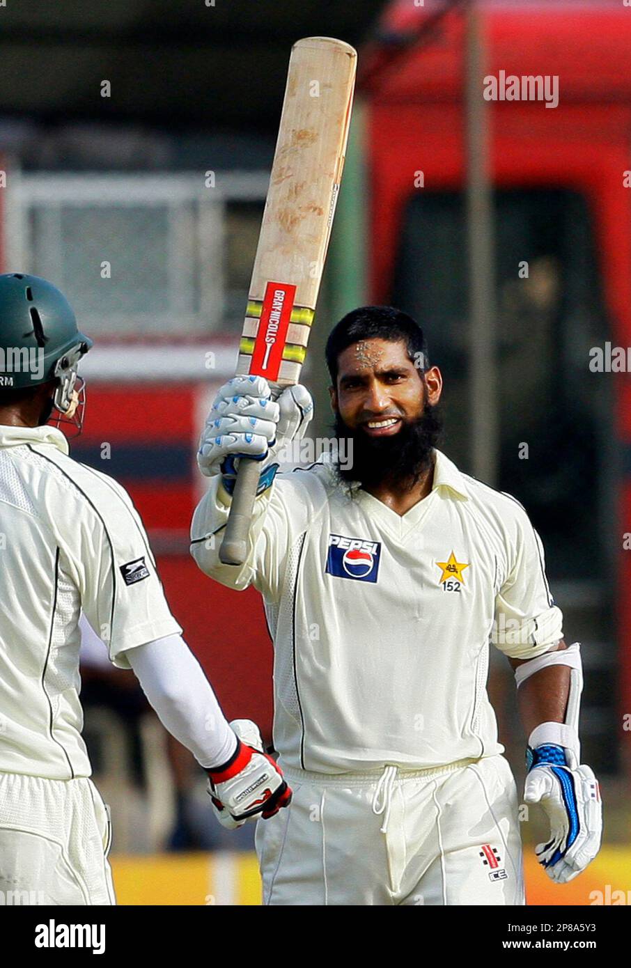 Yousaf Rind Pakistan's cricketer Mohammad Yousaf, right, acknowledges after ...