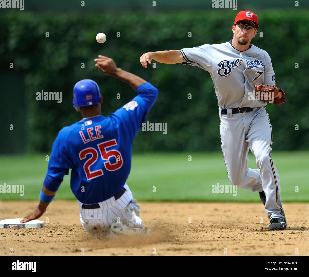 Milwaukee Brewers' J.J. Hardy slides home during the fourth inning of a  baseball game Thursday, May 14, 2009, in Milwaukee. (AP Photo/Morry Gash  Stock Photo - Alamy