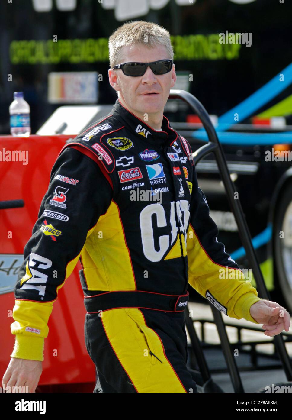 Jeff Burton walks to his garage during practice for the NASCAR Sprint ...