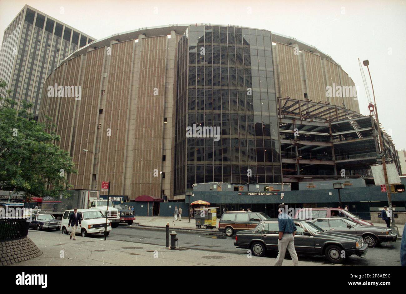 FILE- In this July 1990 file photo, New York City's Madison Square Garden rises above the corner of 33rd Street and Eight Avenue. A new report by the New York Police Department states that managers and developers of high-profile skyscrapers, sports stadiums and other structures in the city need to take more steps to guard against terrorist attacks. "The same qualities that make the city's buildings recognized icons of design, culture and commerce also make them continuous targets of terrorism," Police Commissioner Raymond Kelly said in a foreword for the report. (AP Photo/Marty Lederhandler, F Stock Photo