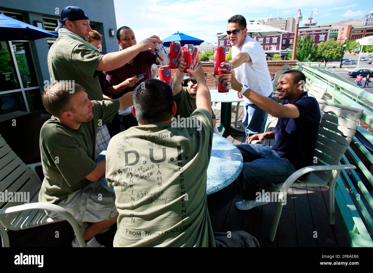 Patrons at Gracie's in Salt Lake City toast as they celebrate Utah's new liquor laws which went