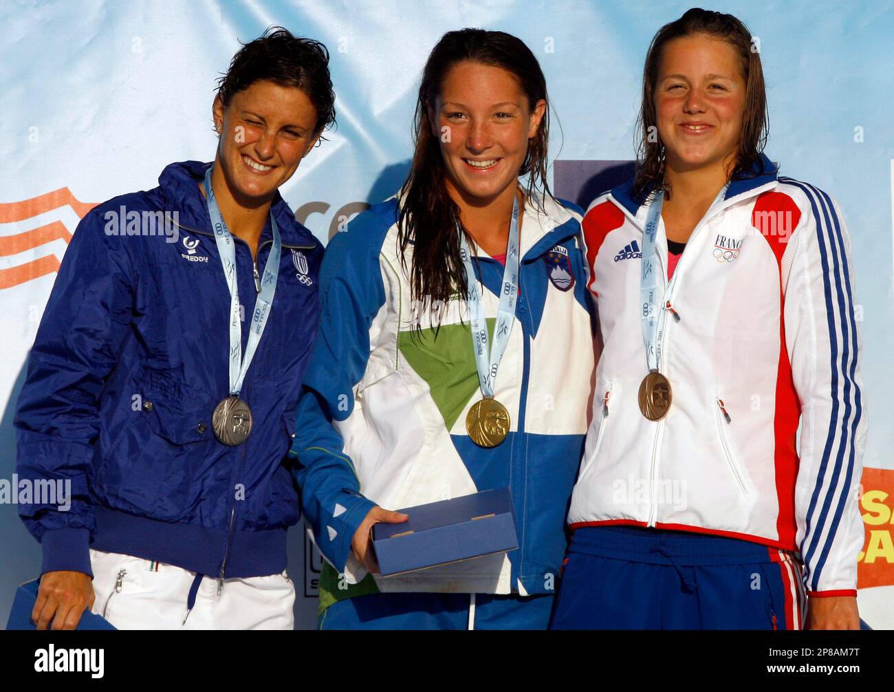 Second placed Francesca Segat, left, and third placed Caterina Giacchetti,  both from Italy, pose with their medals after the winning ceremony for the  Women's 200 Meter Butterfly final race at the European