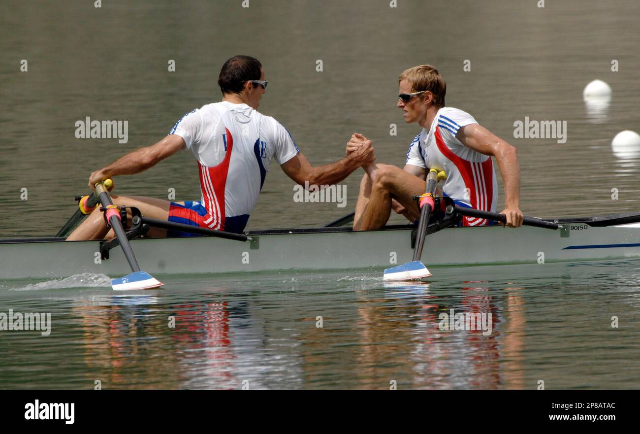 From left, France's Jeremie Azou and Frederic Dufour react after