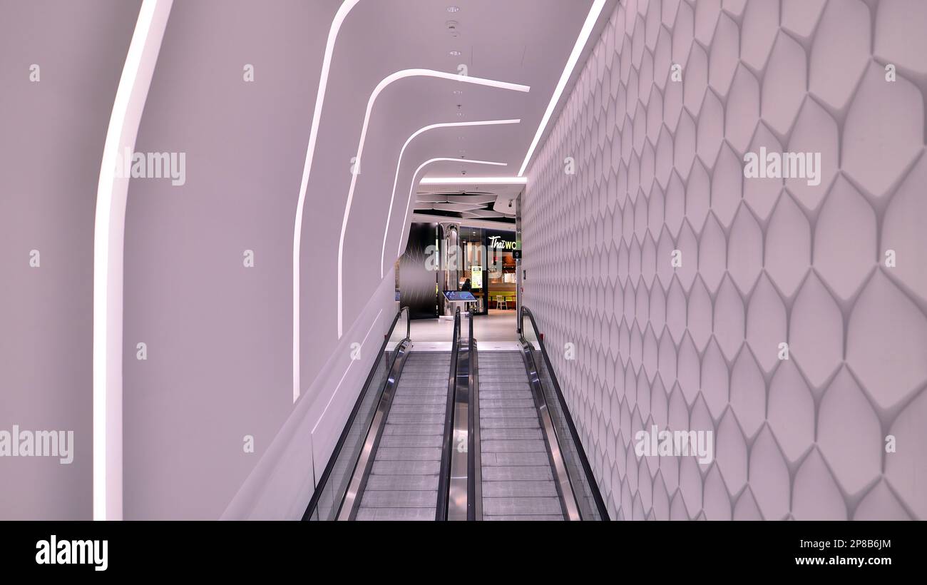 Warsaw, Poland. 8 March 2023. People walking in a shopping mall past
